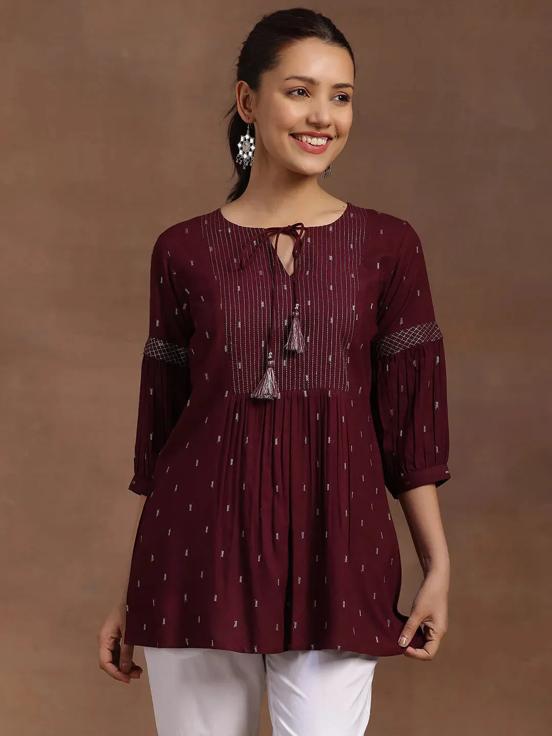 29108O_1_89b48487-70a2-4ad4-bda2-3b305517b7ca.webp Wine Woven Design Rayon A-Line Kurti - Image 1